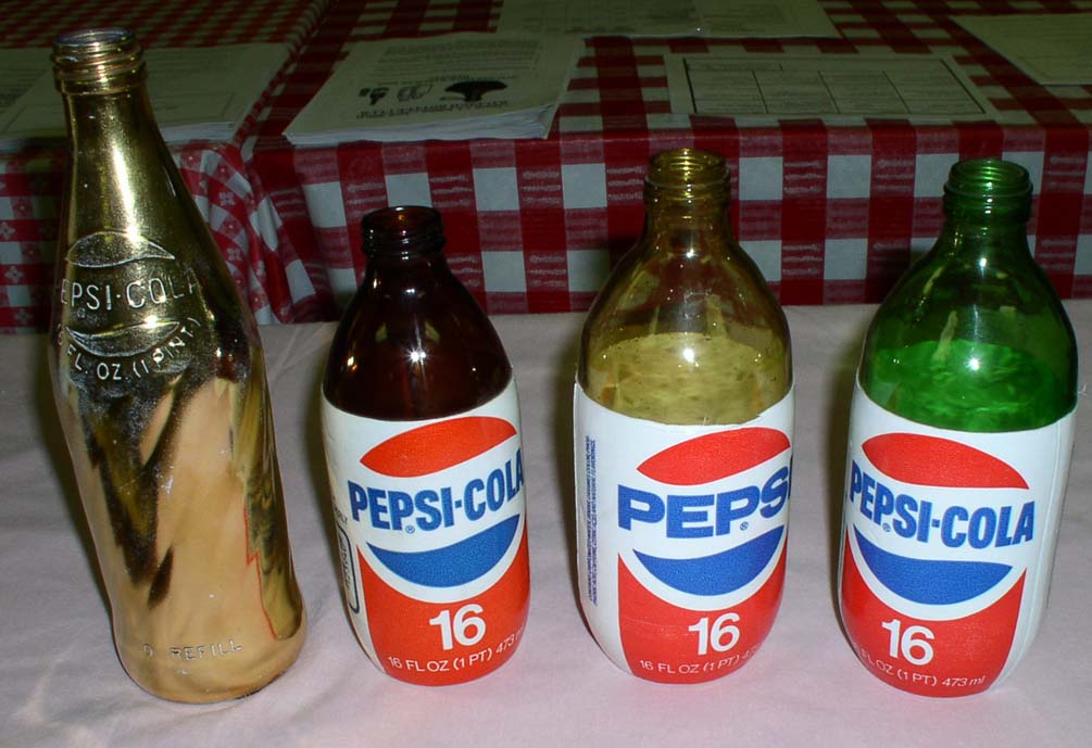 Some different colored throw away Pepsi bottles show by Donnie Medlin. 